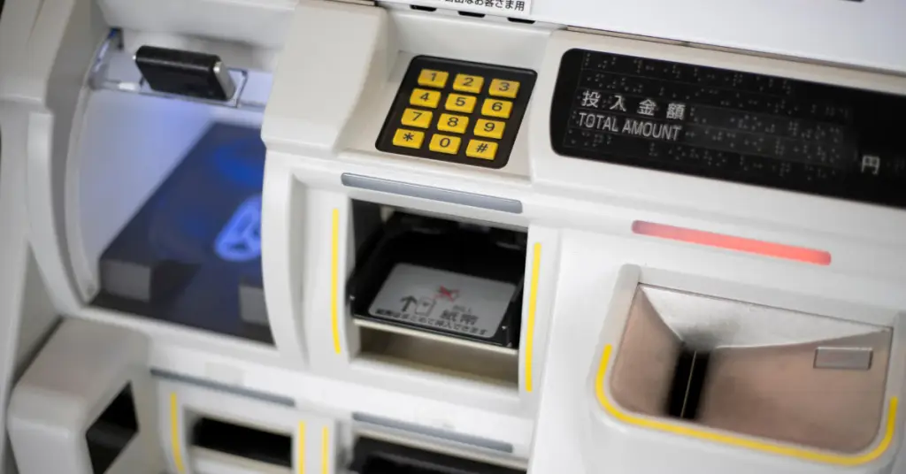 Passenger using IC card at Yamanote Line ticket gate
